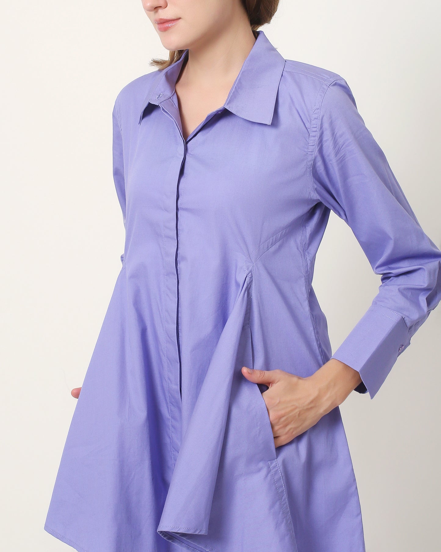 This modern and stylish shirt is adorned with an elegant silhouette and drapery hem. Featured with a mandarin collar and cuff sleeves to complete the design.